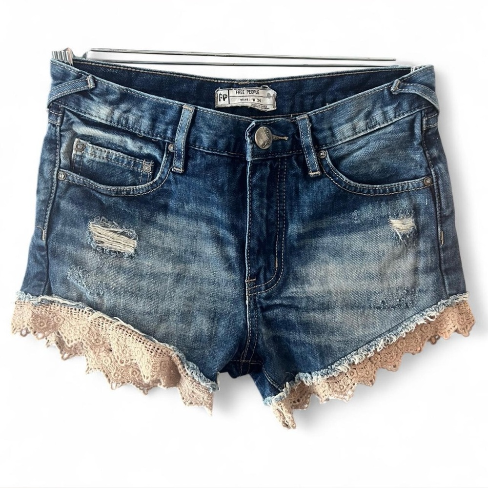 Free People Distressed Denim Shorts with Lace Trim